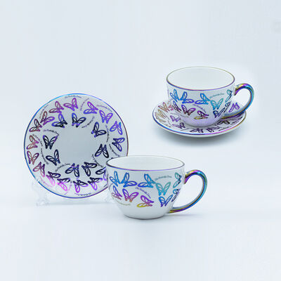 Calidad 470 ml de taza y platillo de recuerdo con electroplacado y calcomanía para los entusiastas de Liang Zhu Fábrica